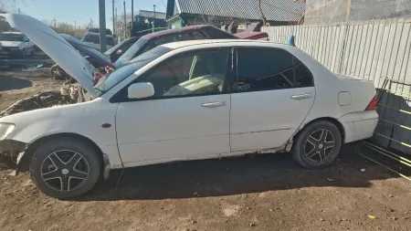 Автомобиль в сборе (кузов) на разборку на Митсубиси Лансер — фото 2